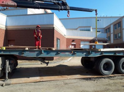 Lifting Road Plates with Magnets